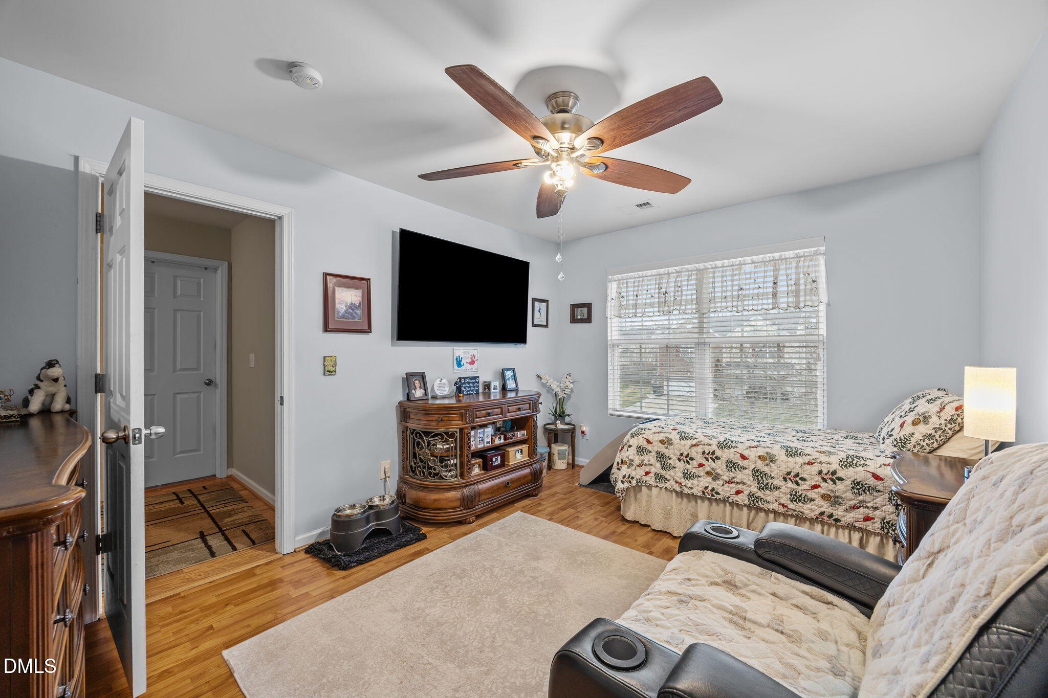 1511 Brambleton Court Graham, NC 27253 - Photo 30 of 43 a bedroom with furniture and a flat screen tv