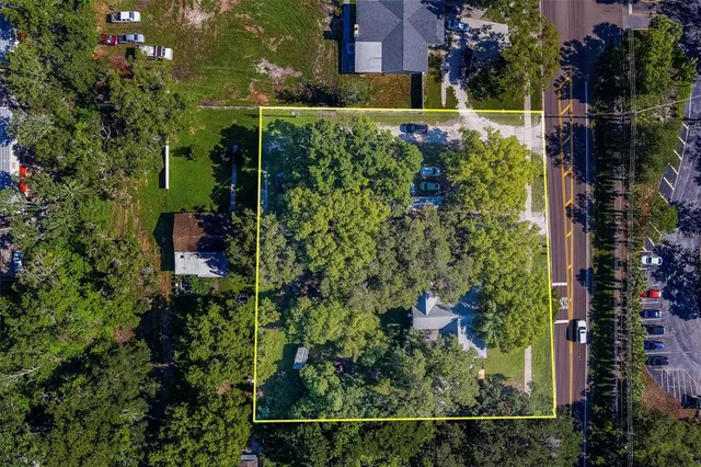 an aerial view of a house with a garden