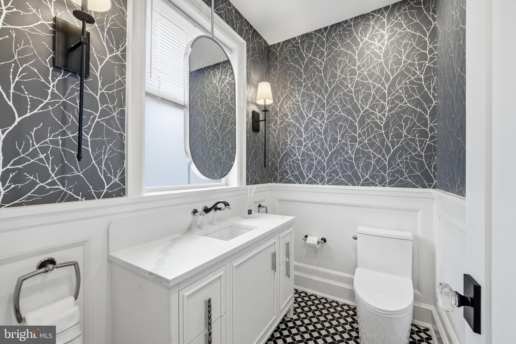 108 Avondale Avenue Haddonfield, NJ 08033 - Photo 24 of 65 a bathroom with a sink and a mirror