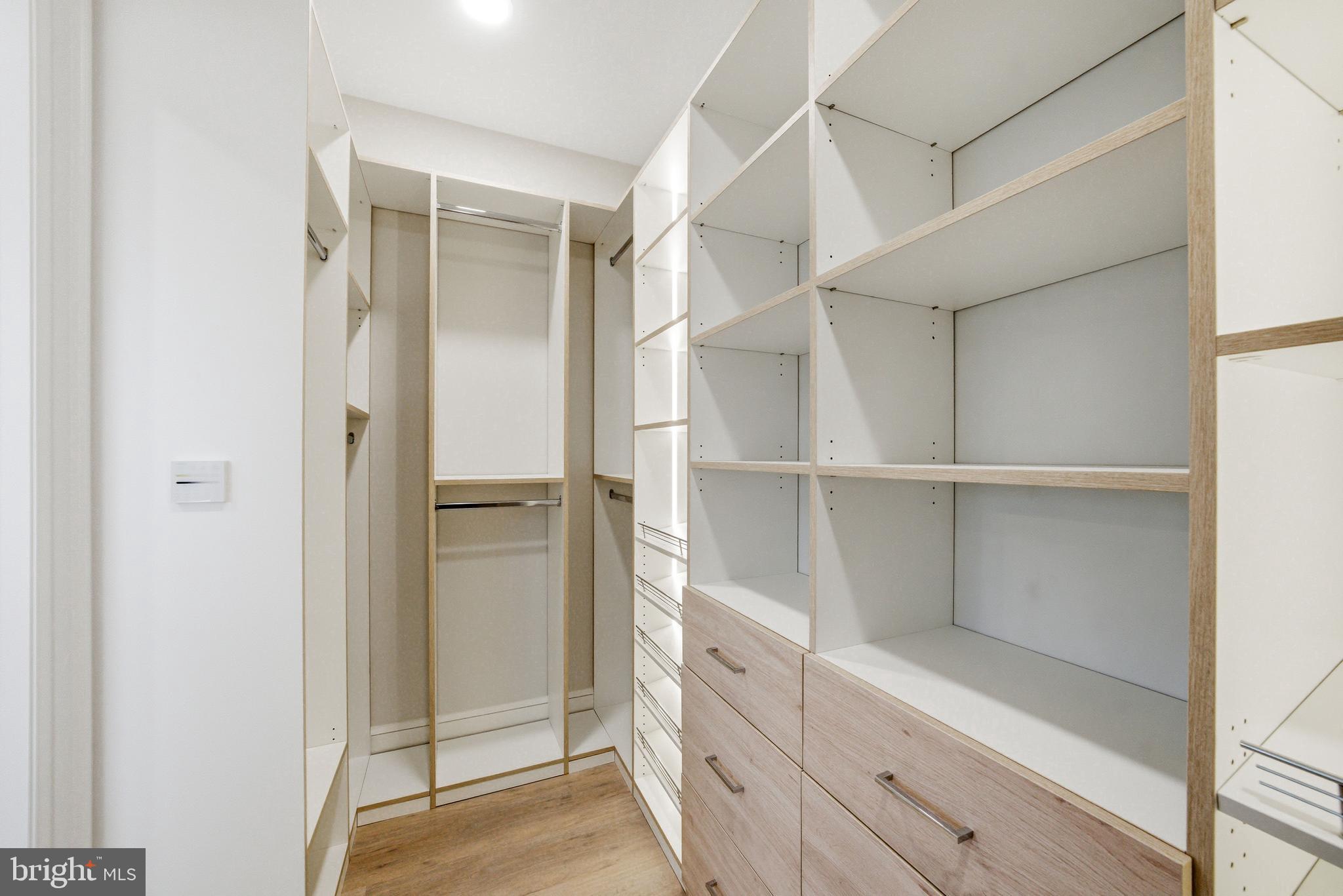 108 Avondale Avenue Haddonfield, NJ 08033 - Photo 39 of 65 a view of walk in closet with empty racks