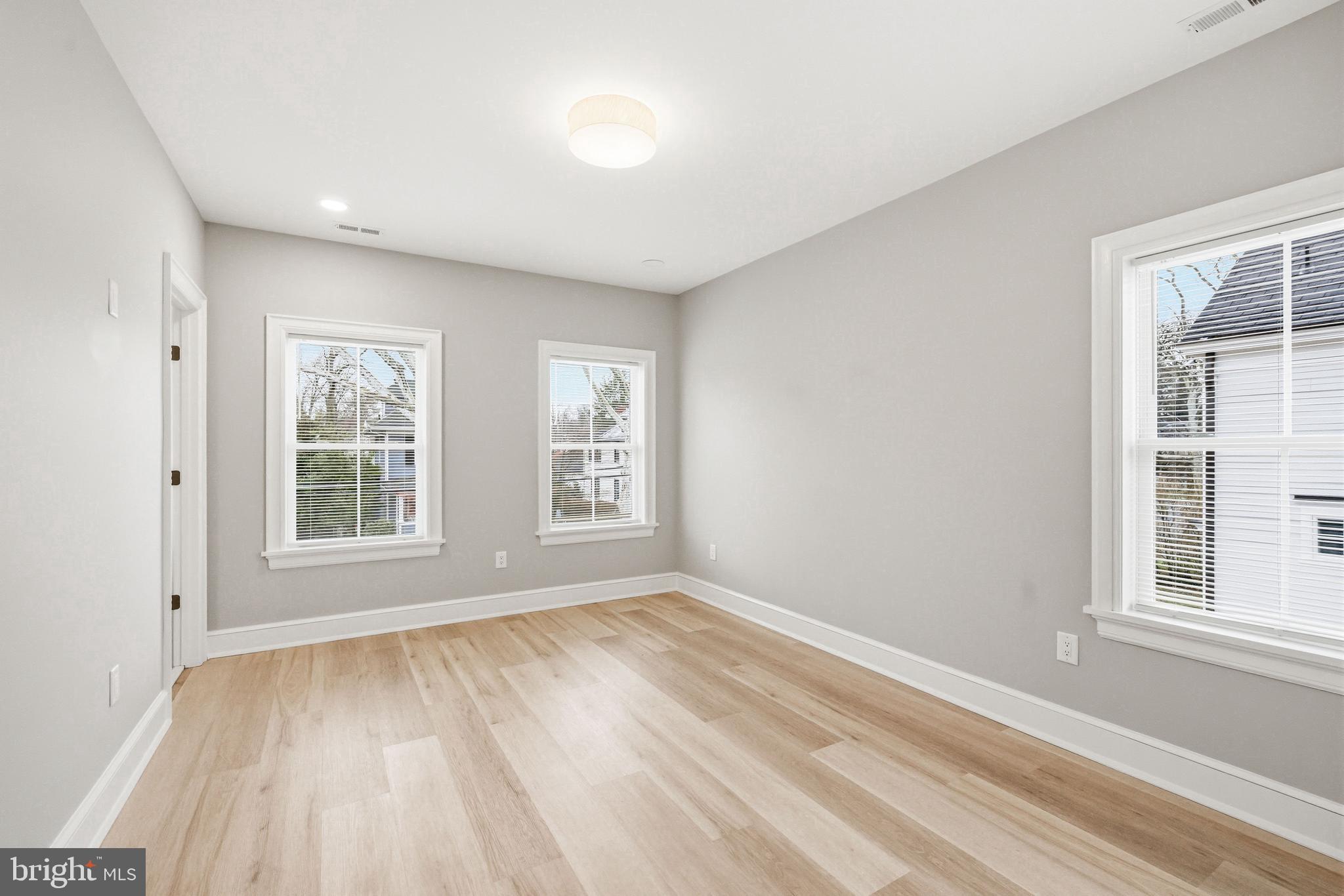 108 Avondale Avenue Haddonfield, NJ 08033 - Photo 40 of 65 a view of empty room with wooden floor and fan