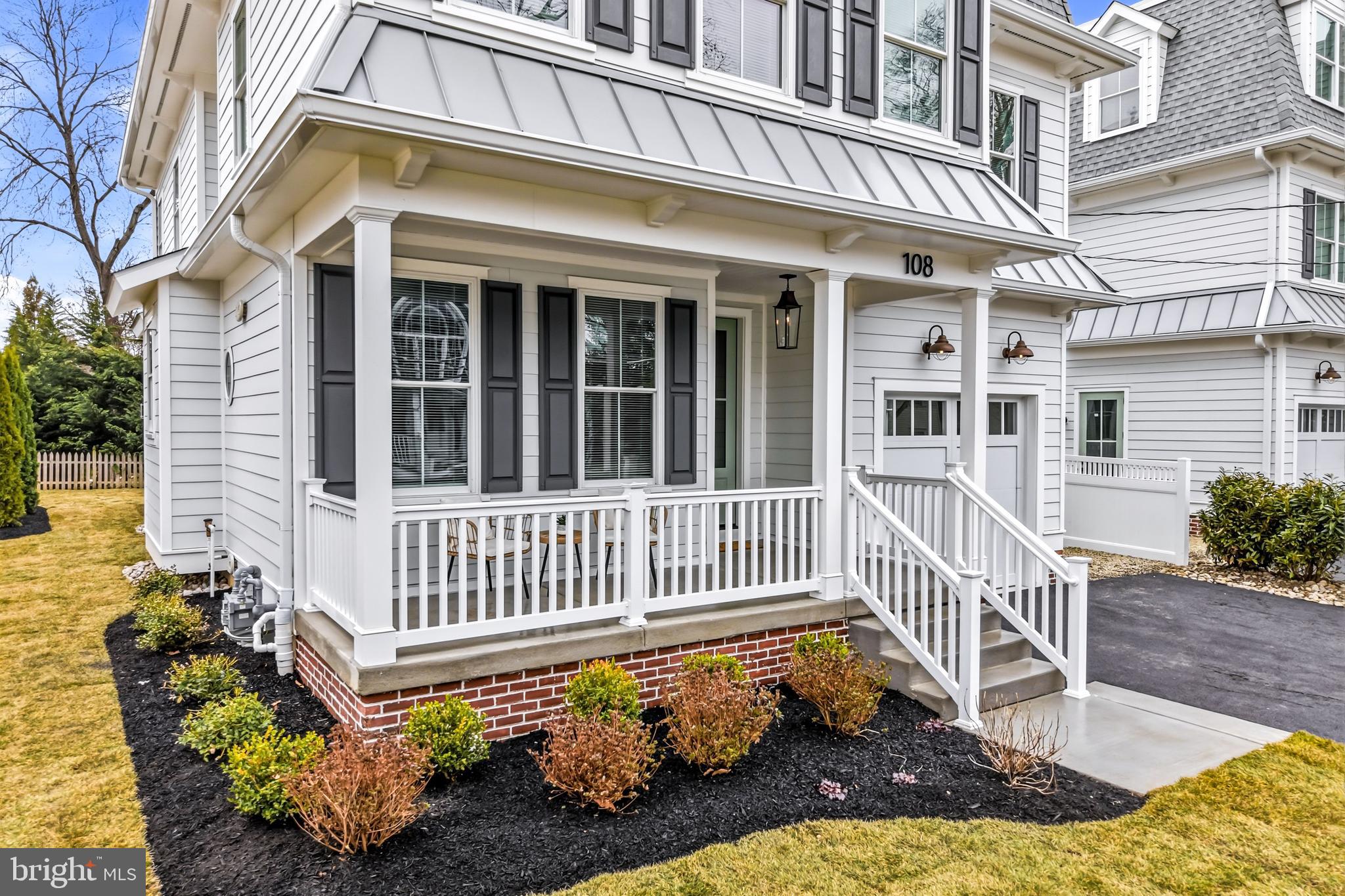 108 Avondale Avenue Haddonfield, NJ 08033 - Photo 4 of 65 a front view of a house with a yard