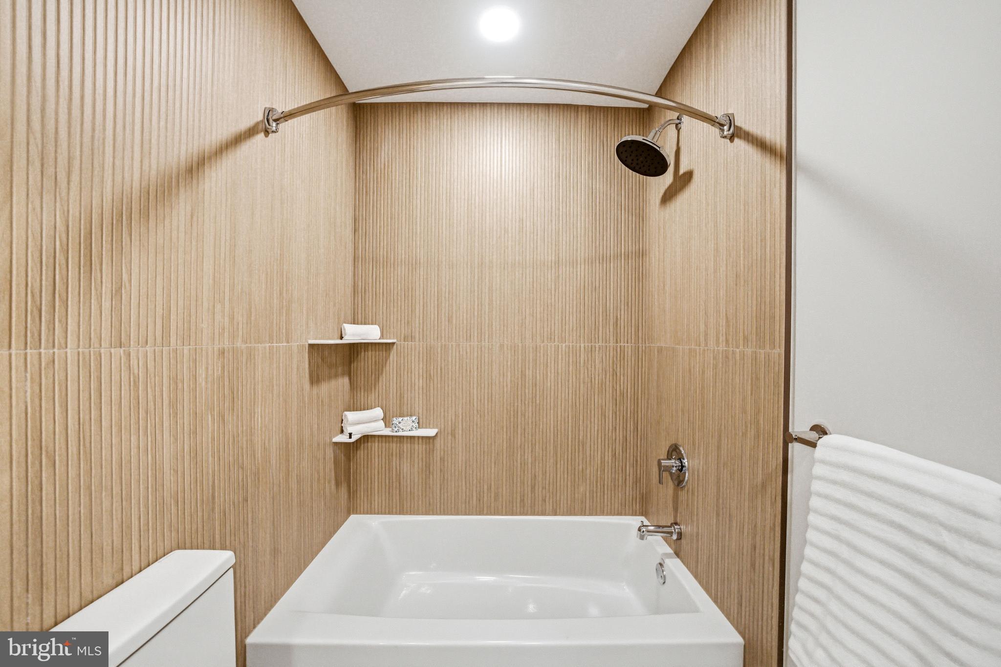 108 Avondale Avenue Haddonfield, NJ 08033 - Photo 47 of 65 a bathroom with a shower and a bath tub