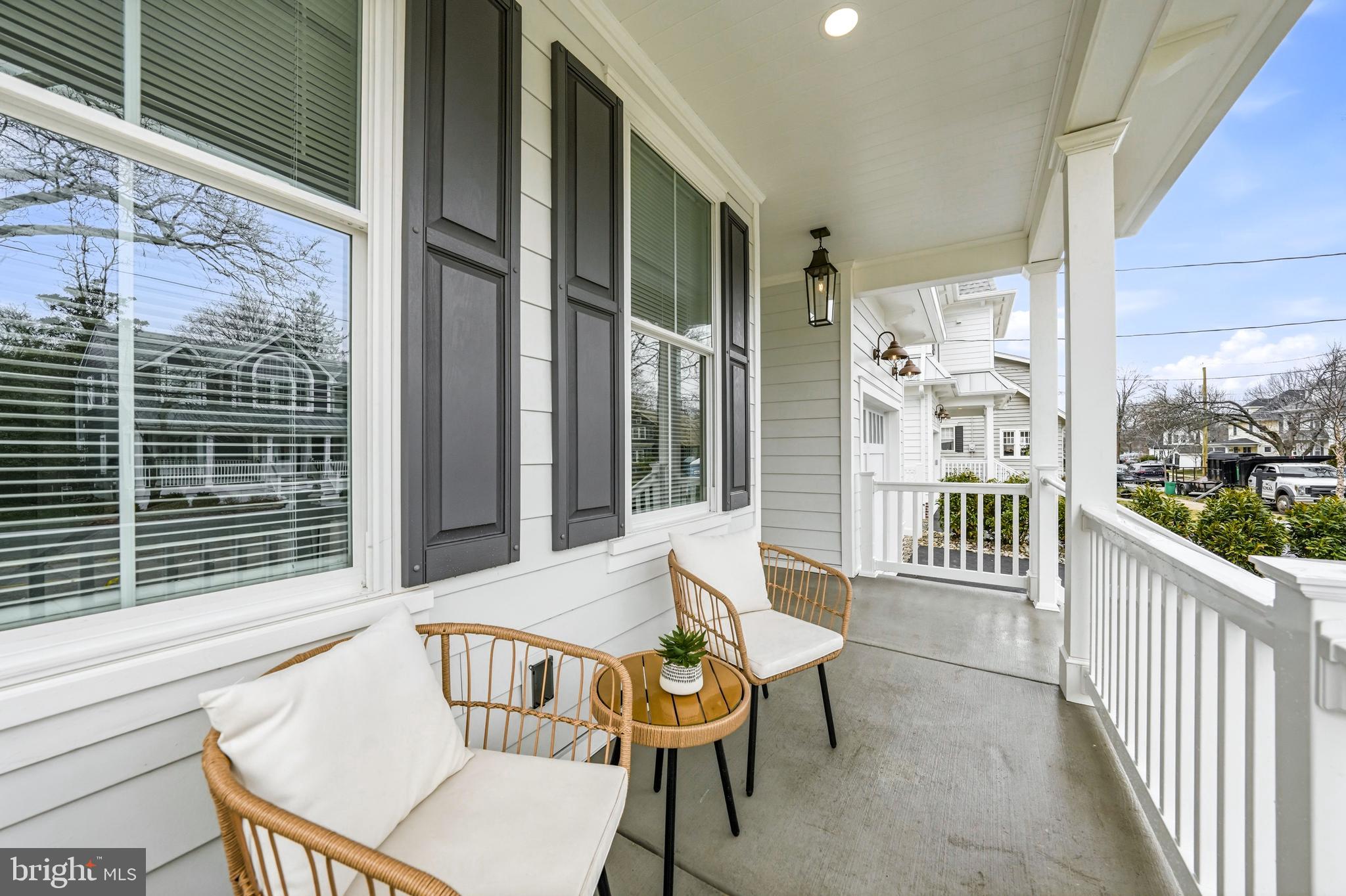 108 Avondale Avenue Haddonfield, NJ 08033 - Photo 5 of 65 a balcony with couple of chairs and a couch