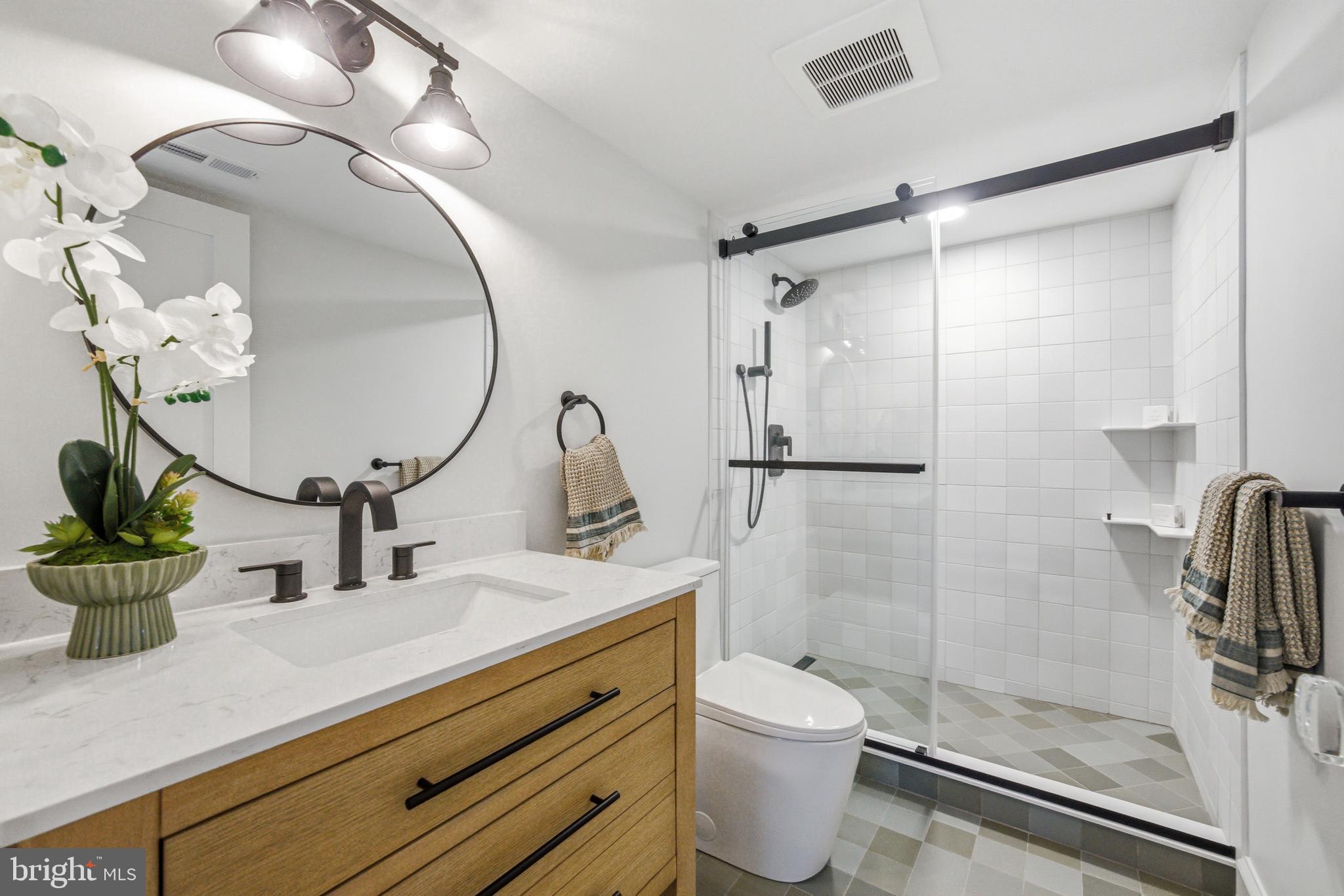 108 Avondale Avenue Haddonfield, NJ 08033 - Photo 53 of 65 a bathroom with a double vanity sink toilet and shower