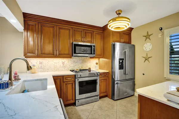 $445,000 | 3180 Northeast 48th Court, Unit 404, Lighthouse Point, FL 33064