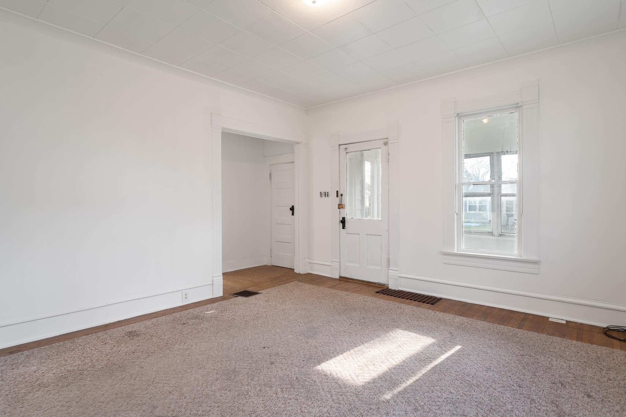 506 South 4th Street Oregon, IL 61061 - Photo 11 of 45 an empty room with windows