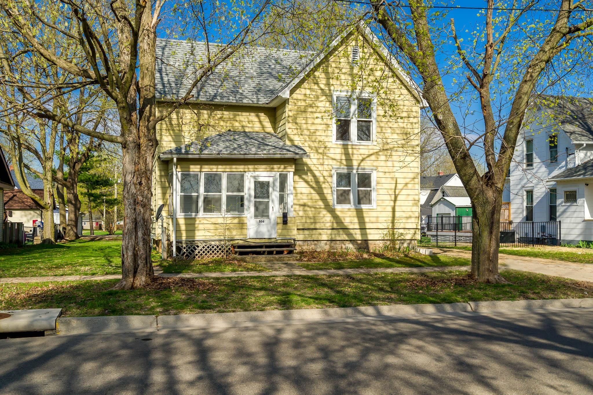 506 South 4th Street Oregon, IL 61061 - Photo 2 of 45 a front view of a house with a yard