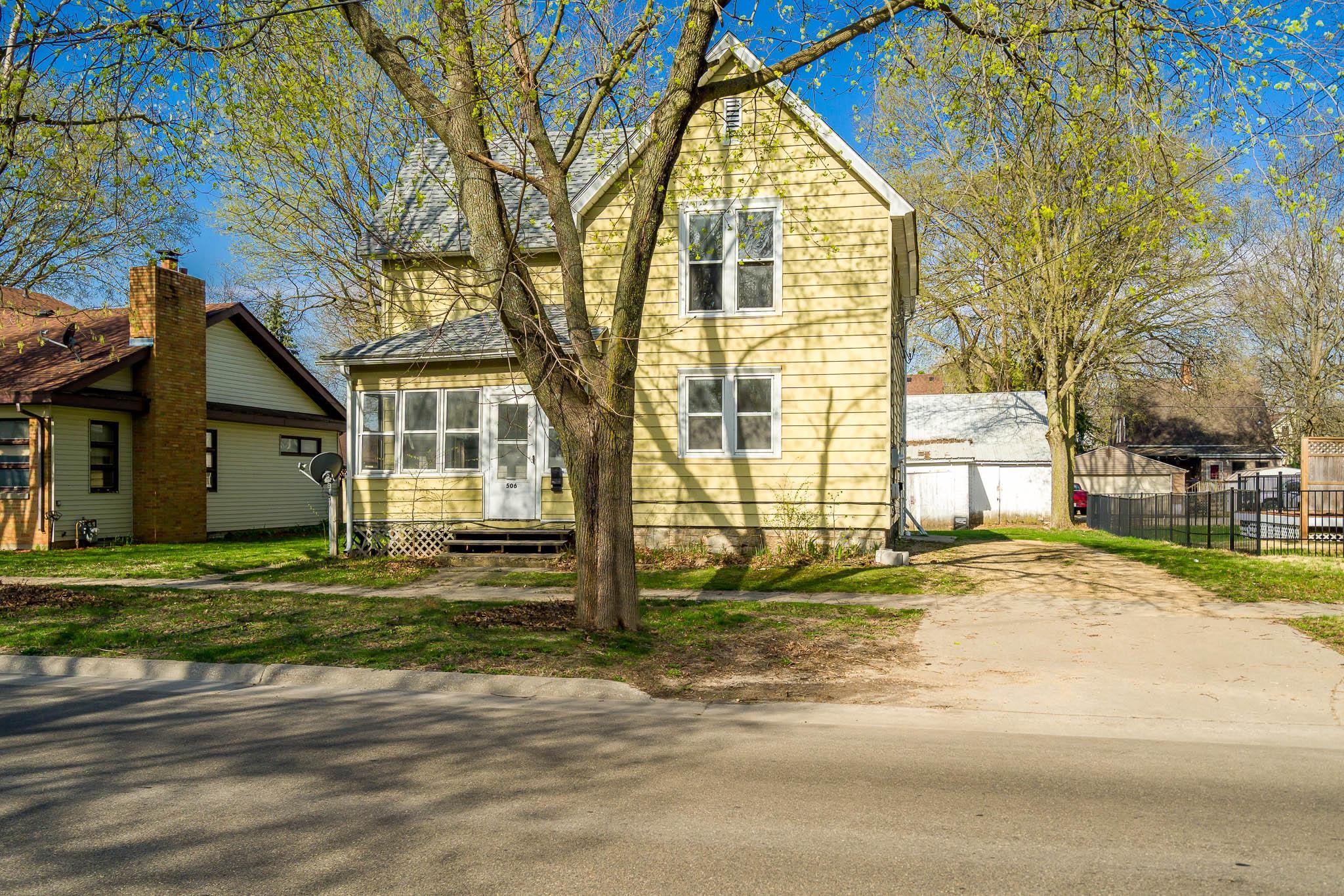 506 South 4th Street Oregon, IL 61061 - Photo 3 of 45 a view of a house with a yard and road