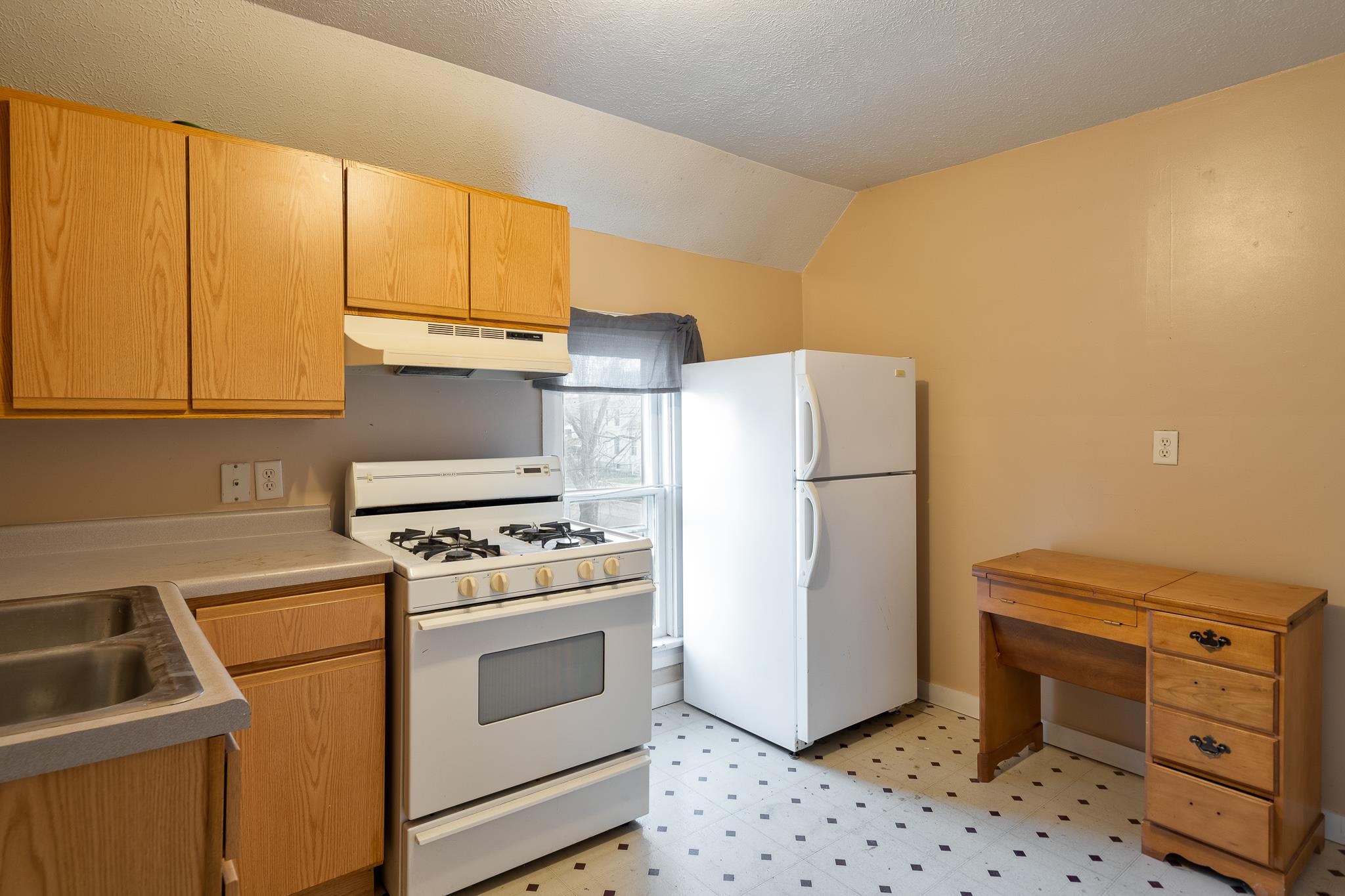 506 South 4th Street Oregon, IL 61061 - Photo 31 of 45 a kitchen with appliances a sink and a cabinets