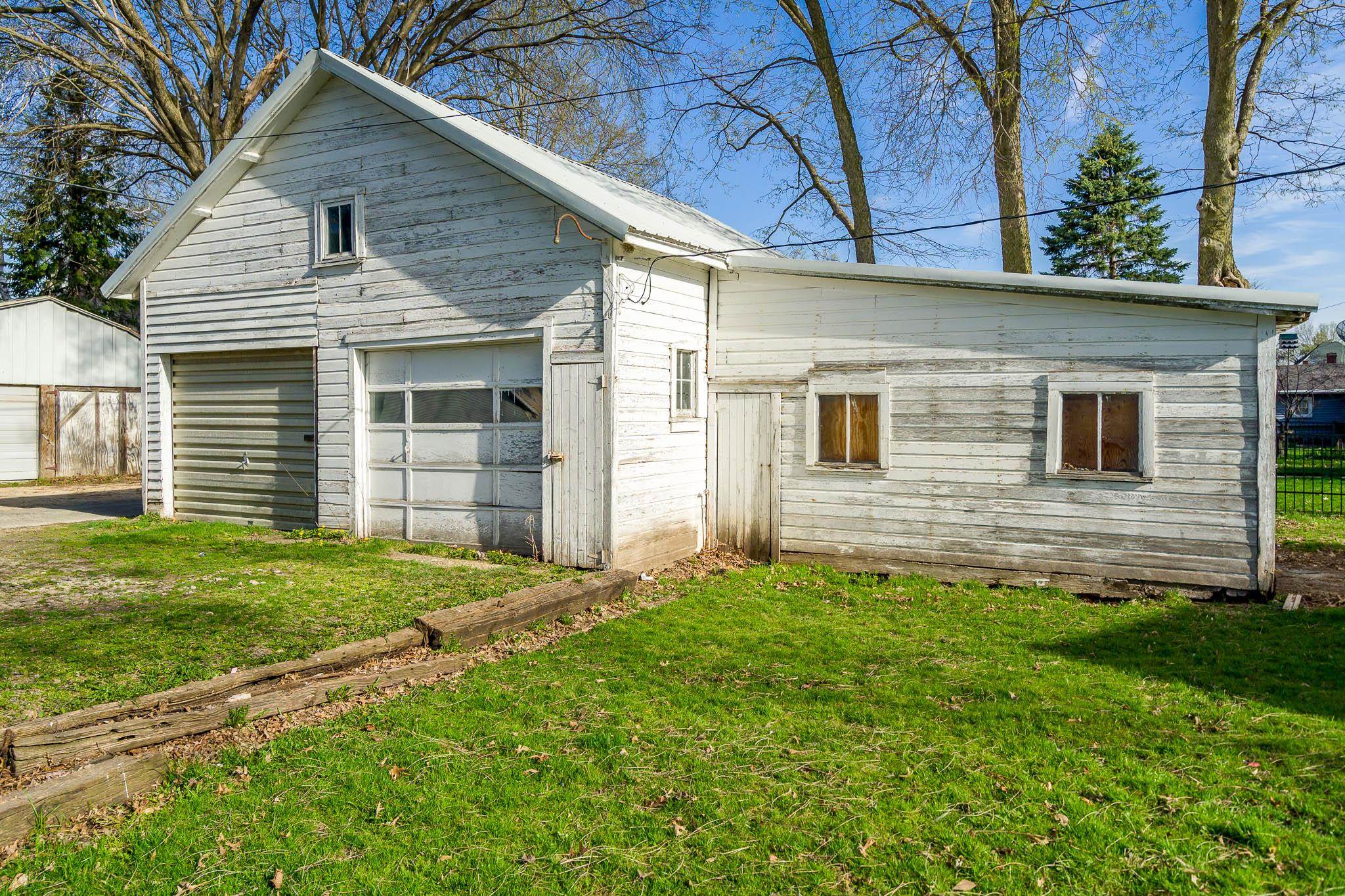 506 South 4th Street Oregon, IL 61061 - Photo 4 of 45 a front view of a house with a yard