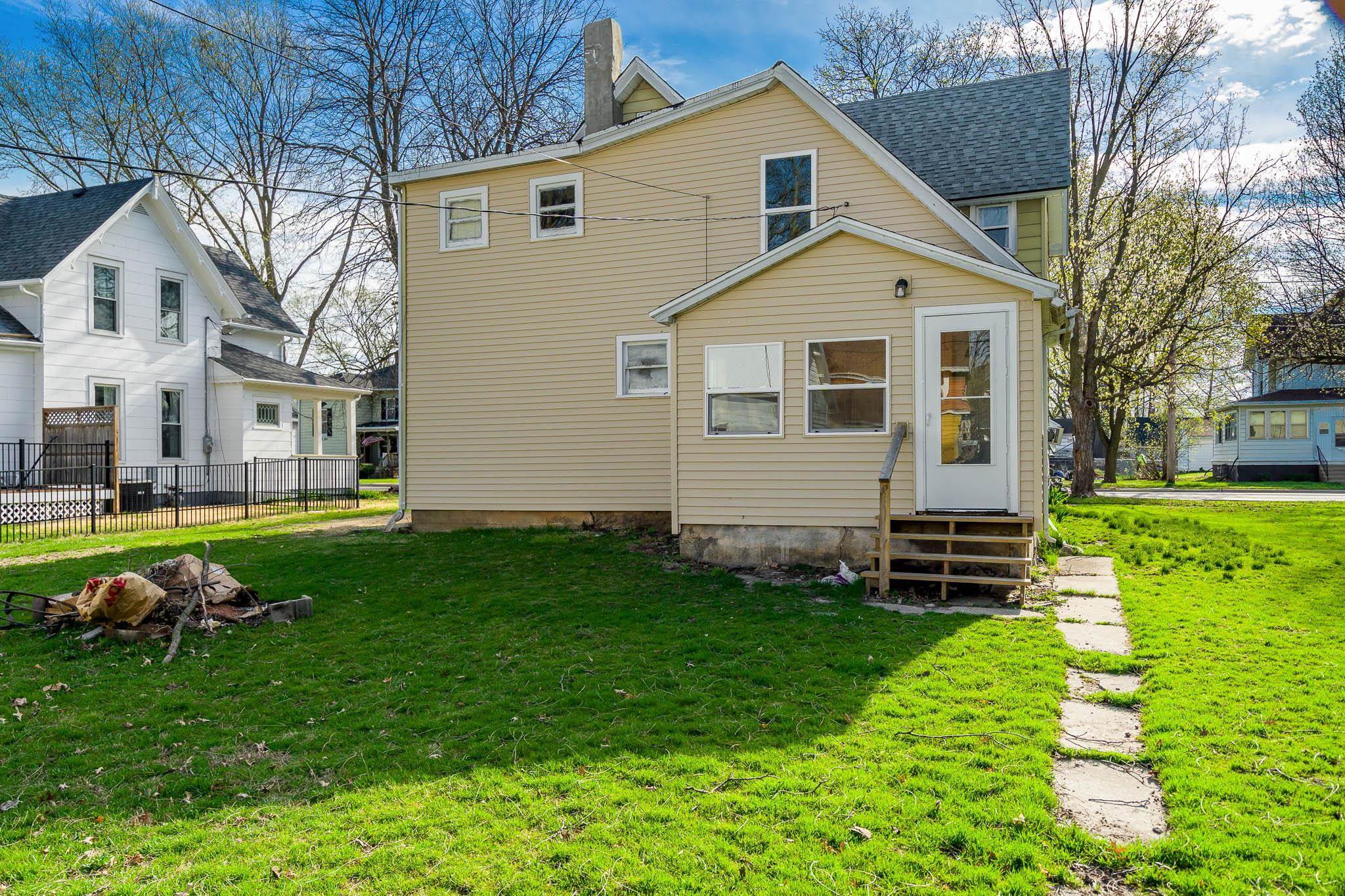 506 South 4th Street Oregon, IL 61061 - Photo 6 of 45 a front view of house with yard and green space