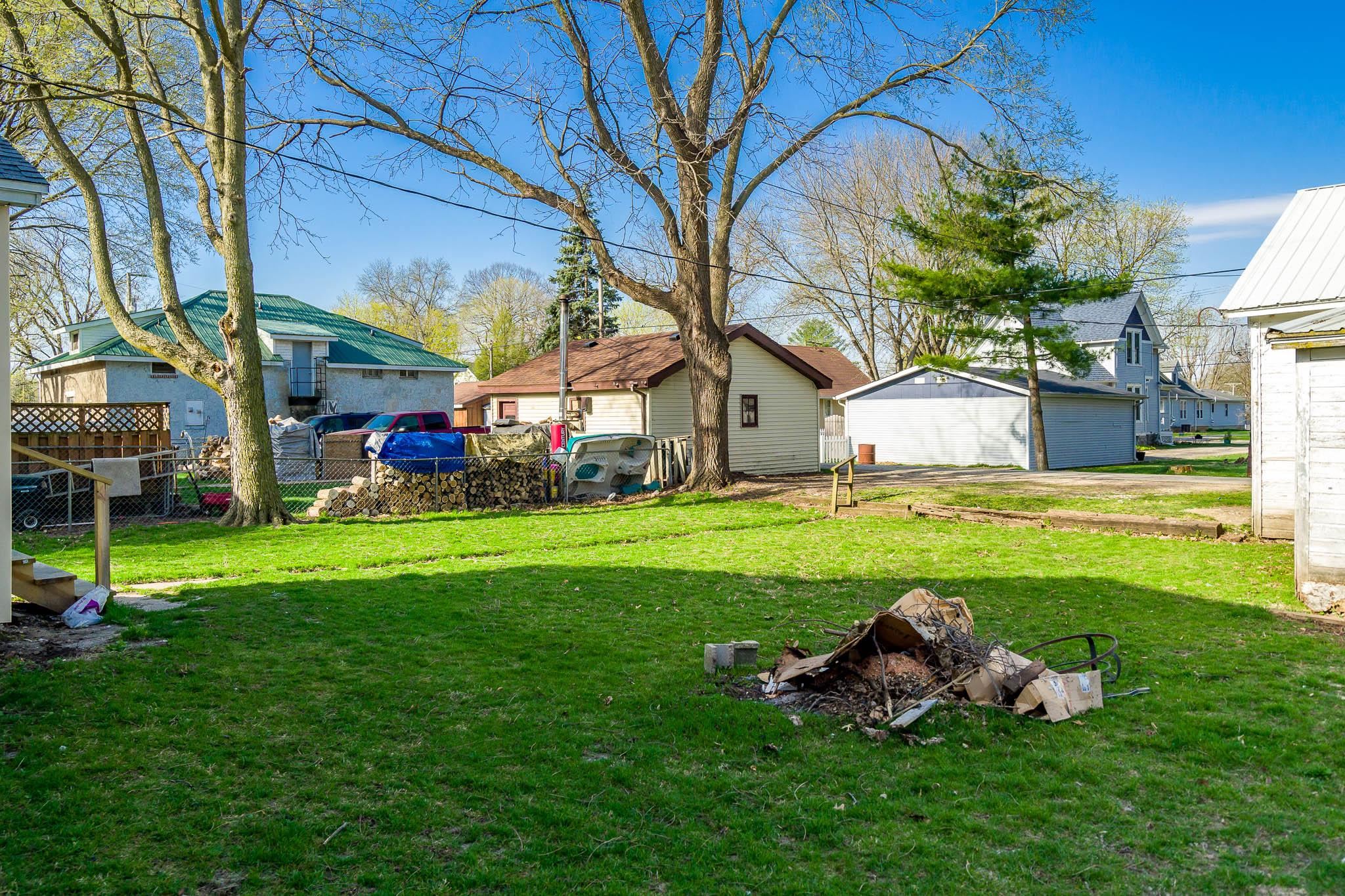 506 South 4th Street Oregon, IL 61061 - Photo 7 of 45 a view of a house with a backyard porch and sitting area