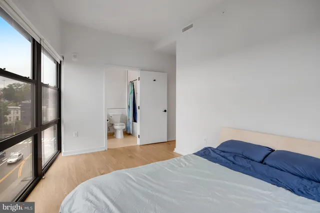 a bathroom with a shower and a toilet