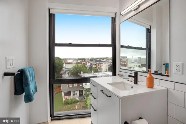 a room with a chair and a window