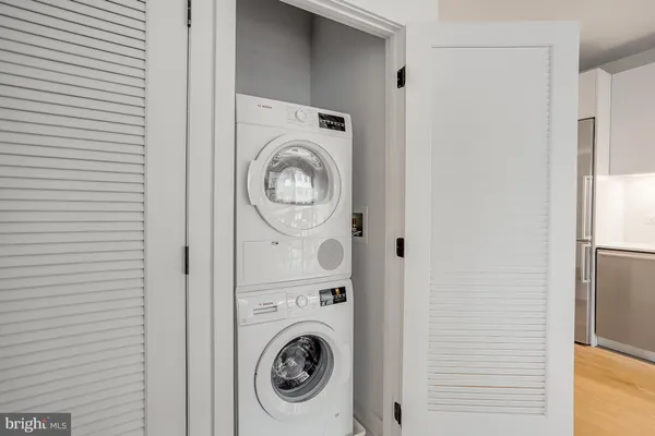 a view of swimming pool with a lounge chair