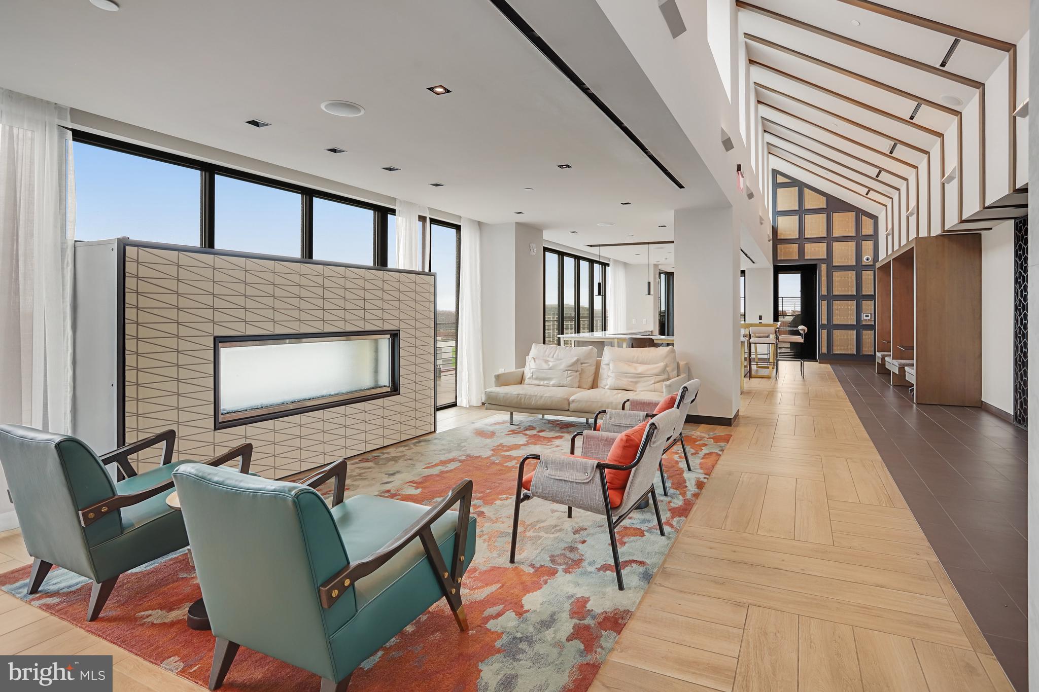 1625 Eckington Place Northeast, Unit 604 Washington, DC 20002 - Photo 45 of 68 a living room with furniture and a fireplace