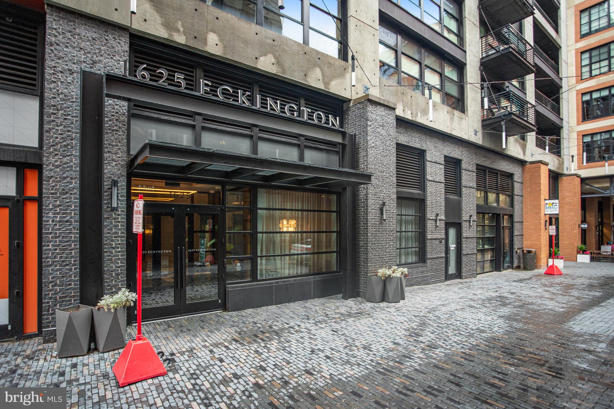 1625 Eckington Place Northeast, Unit 604 Washington, DC 20002 - Photo 66 of 68 a front view of a building with an entrance