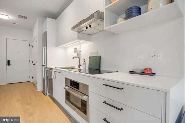 a view of a dining table and chairs in a room