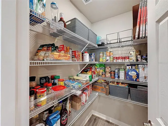 a store room with lots of furniture