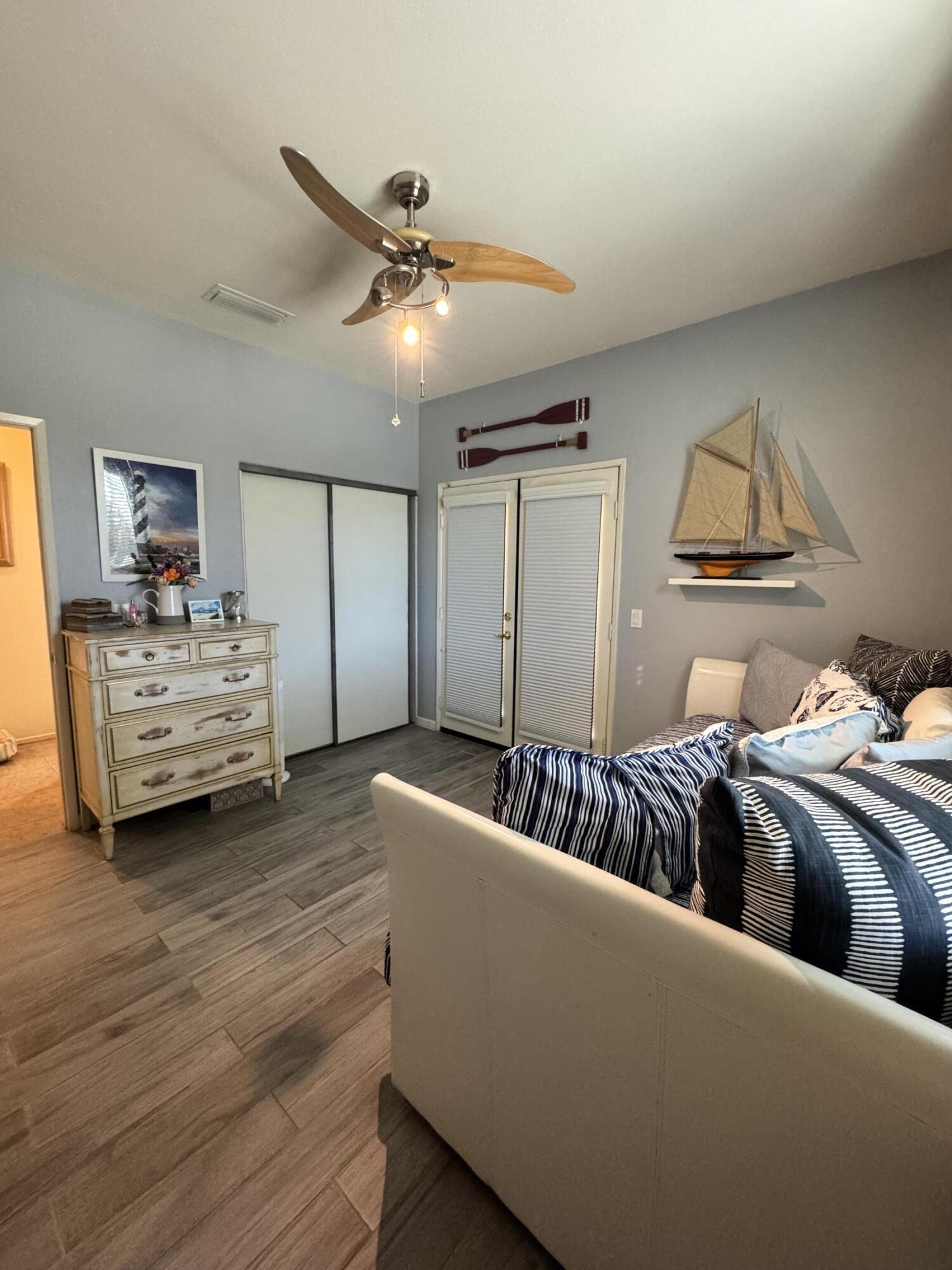 82774 Matthau Drive Indio, CA 92201 - Photo 17 of 44 a living room with furniture and a ceiling fan