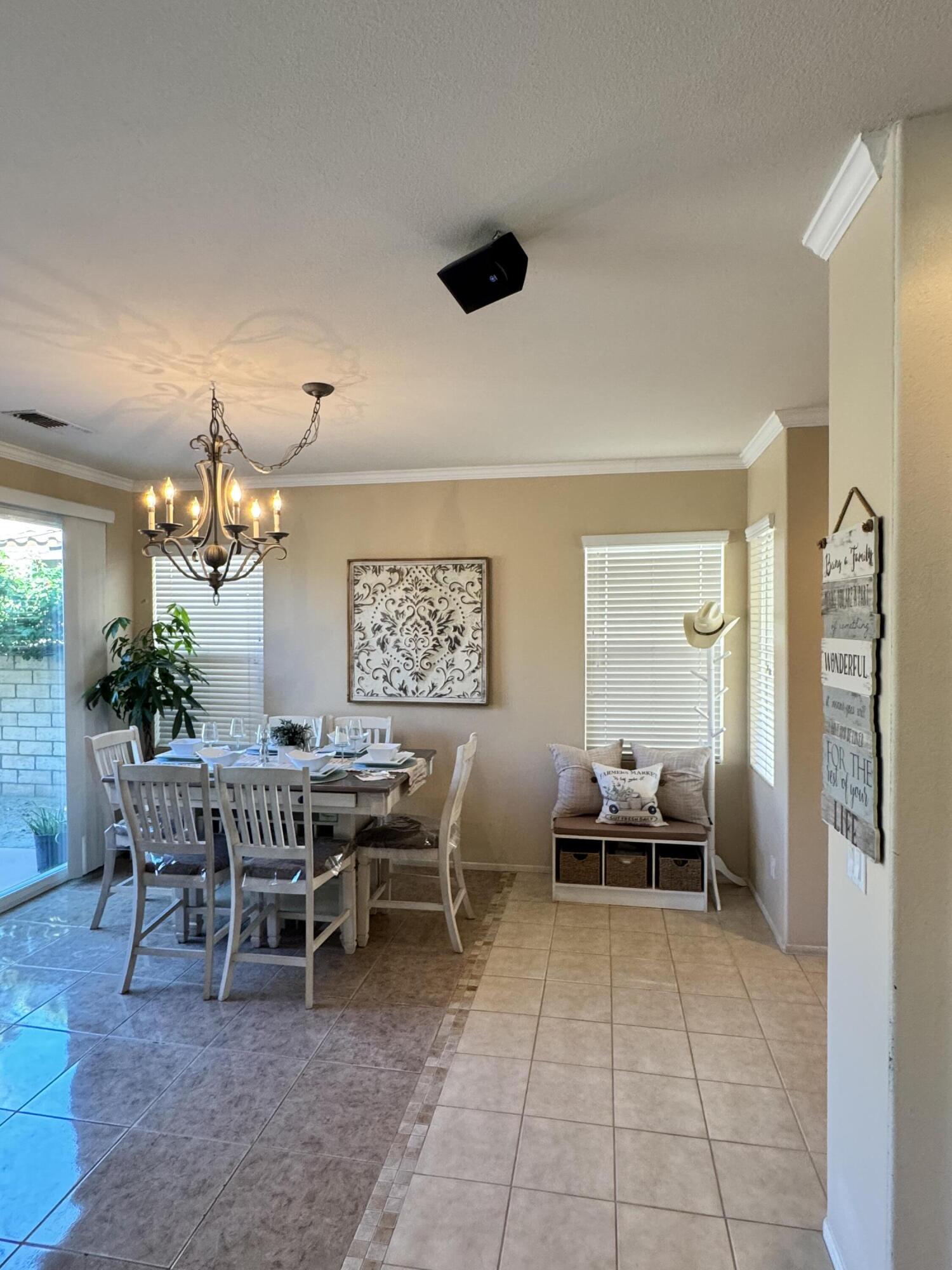 82774 Matthau Drive Indio, CA 92201 - Photo 37 of 44 a view of a dining room with furniture