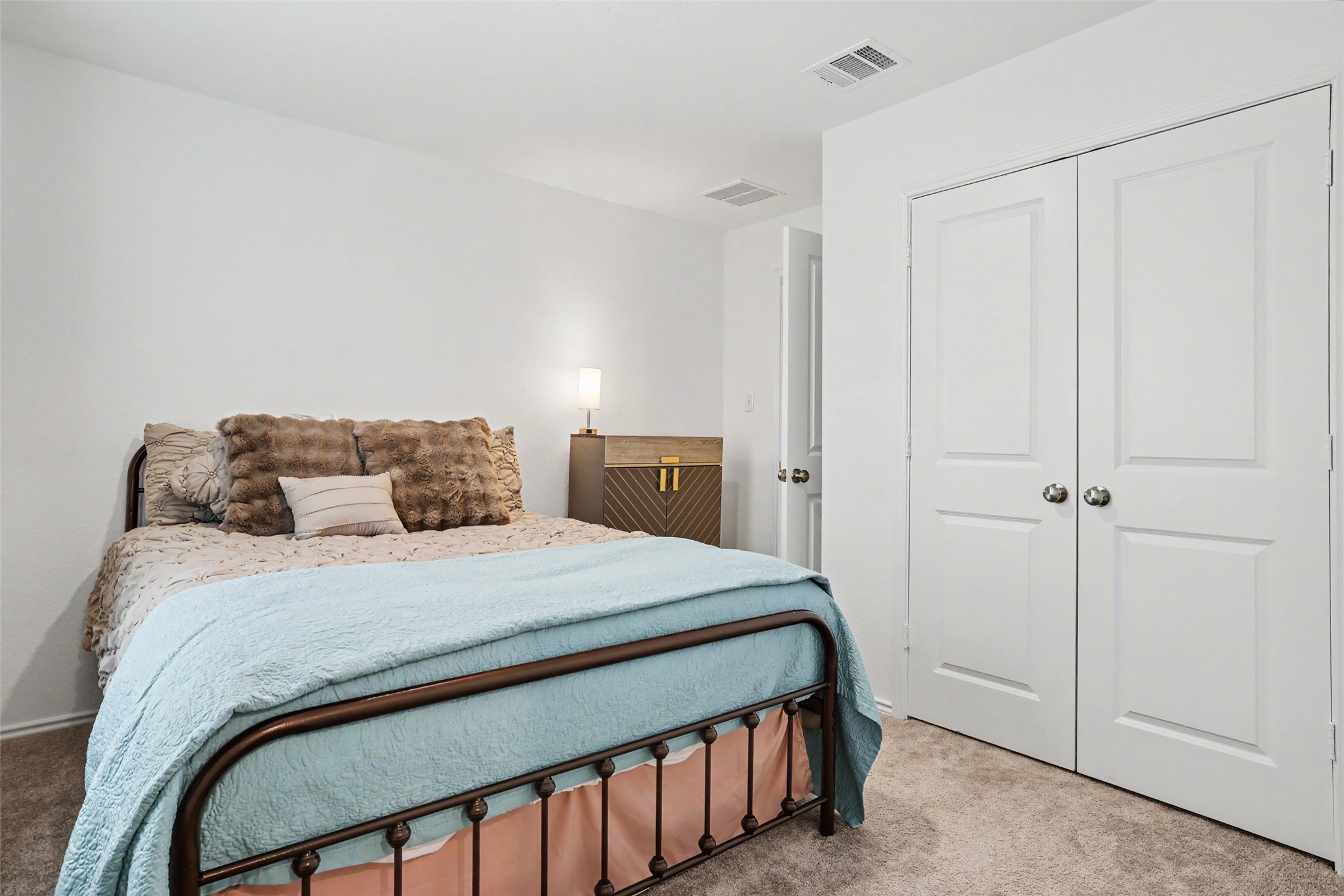 2333 Four Waters Loop Georgetown, TX 78628 - Photo 25 of 35 Neutral tone carpeting complements the white wall finishes
