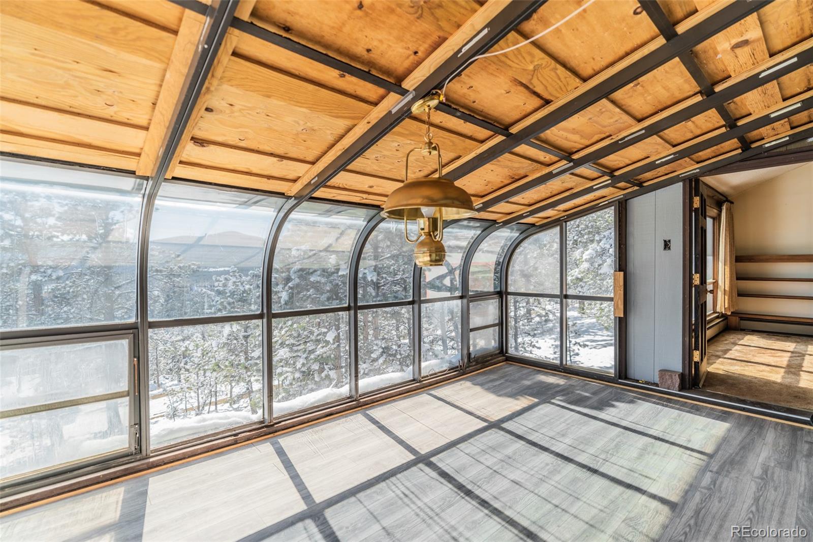1189 Aspen Drive Evergreen, CO 80439 - Photo 15 of 37 a view of front door