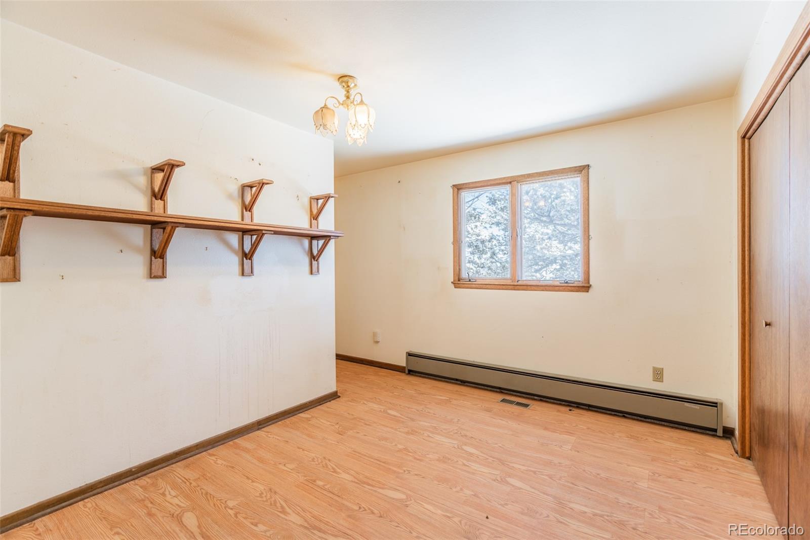 1189 Aspen Drive Evergreen, CO 80439 - Photo 22 of 37 a view of an empty room with a window
