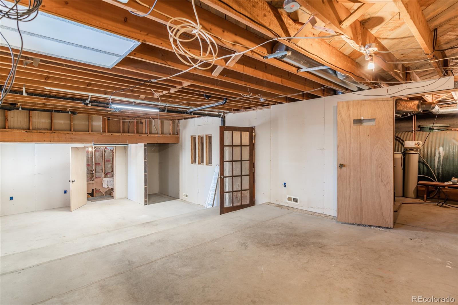1189 Aspen Drive Evergreen, CO 80439 - Photo 30 of 37 a view of a room with wooden walls