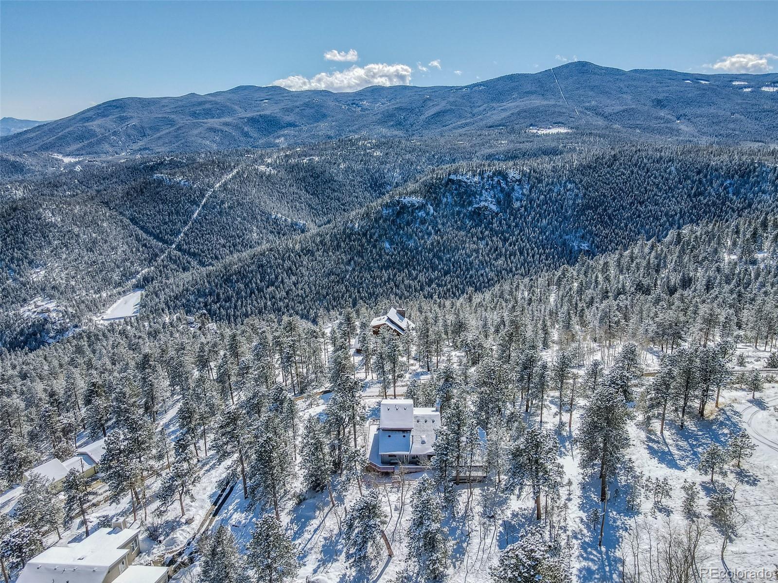 1189 Aspen Drive Evergreen, CO 80439 - Photo 37 of 37 a aerial view of houses with yard