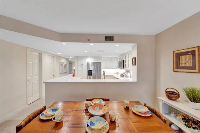 a view of a dining room with furniture