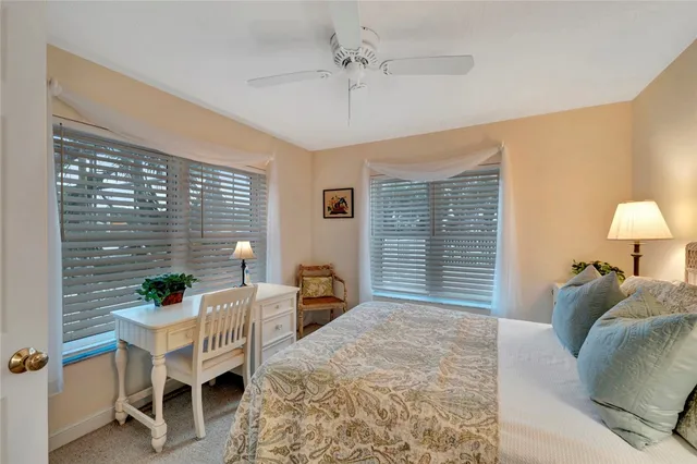 a bedroom with furniture and a bed