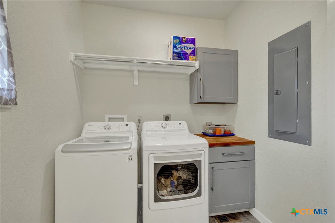 305 Lake Crest Spring Branch, TX 78070 - Photo 16 of 38 a utility room with dryer and washer