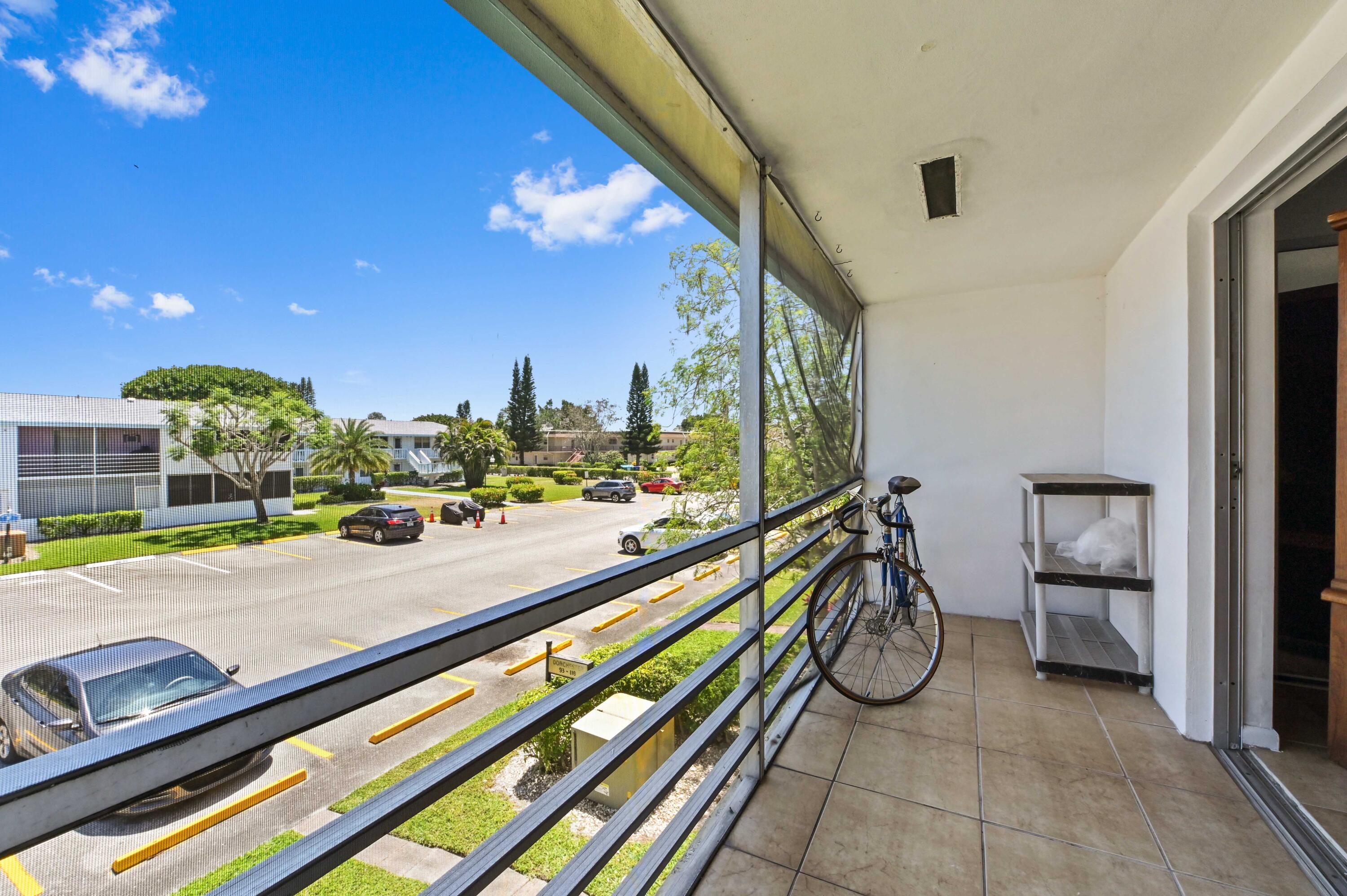 111 Dorchester East, Unit 111 West Palm Beach, FL 33417 - Photo 16 of 21 19 balcony 02
