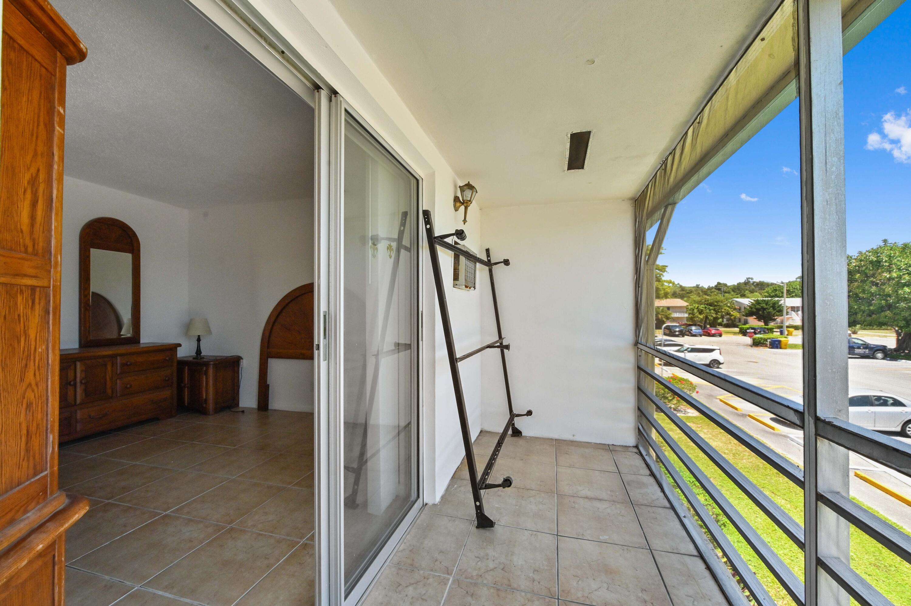 111 Dorchester East, Unit 111 West Palm Beach, FL 33417 - Photo 17 of 21 20 balcony 03