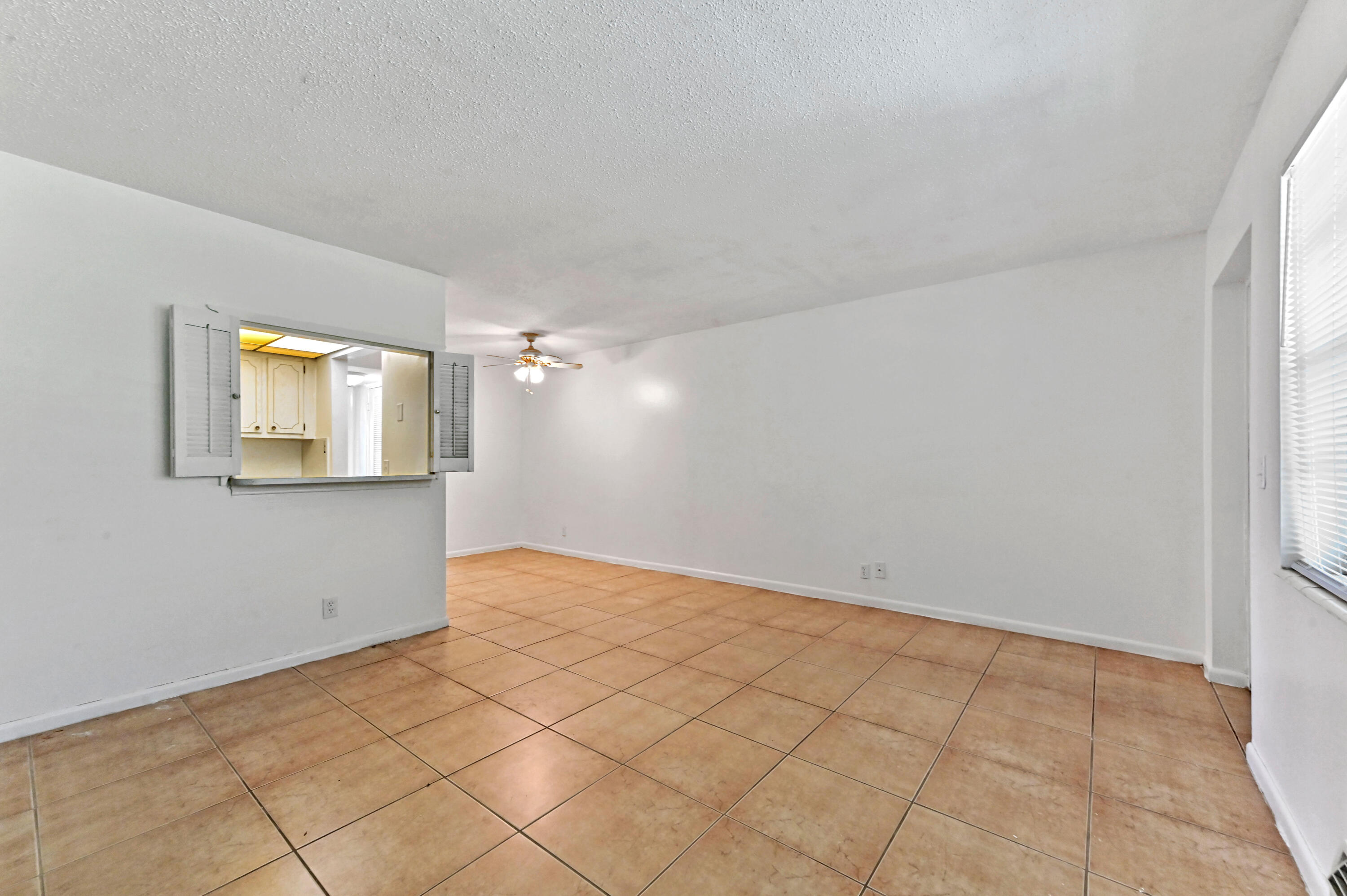 111 Dorchester East, Unit 111 West Palm Beach, FL 33417 - Photo 5 of 21 07 Living Room 03