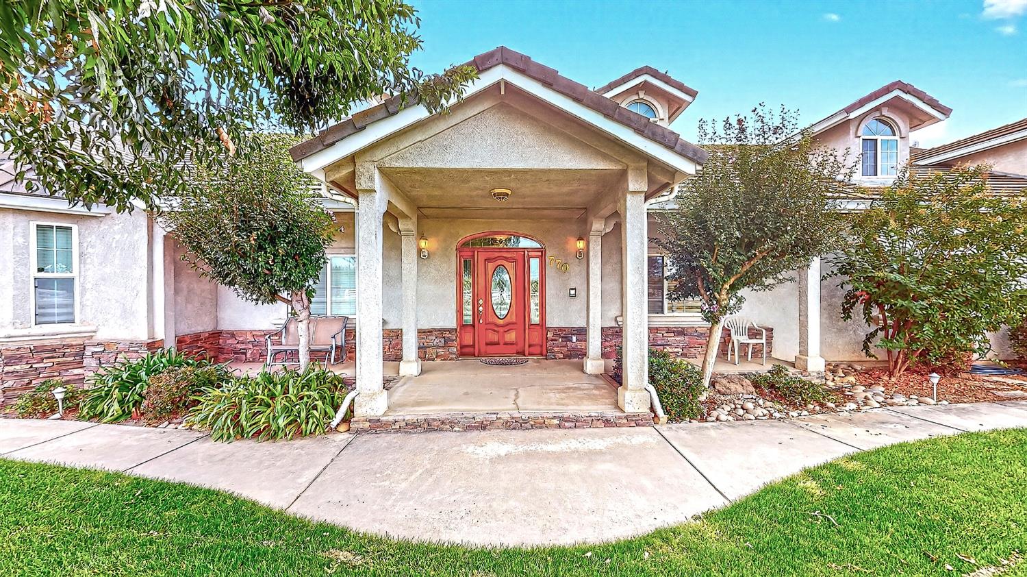 770 Merriam Road Hickman, CA 95323 - Photo 11 of 91 a front view of a house with garden