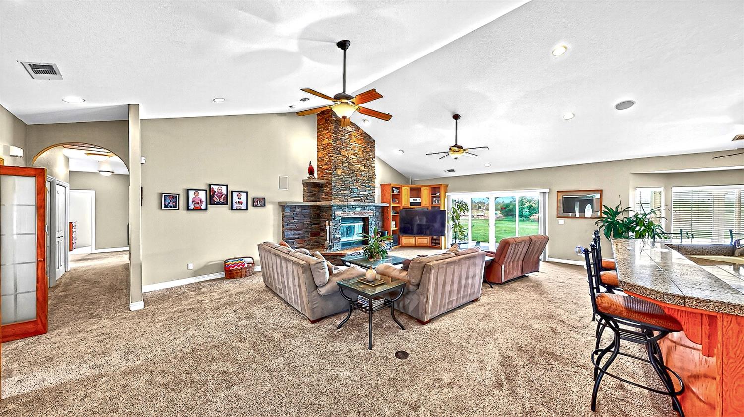 770 Merriam Road Hickman, CA 95323 - Photo 12 of 91 a living room with furniture a chandelier and a rug