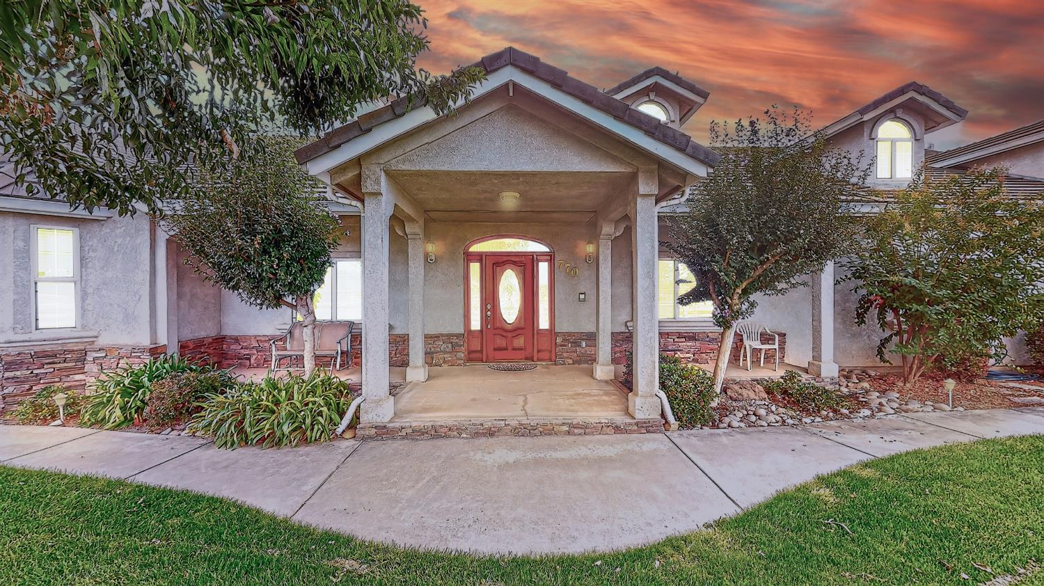 770 Merriam Road Hickman, CA 95323 - Photo 13 of 91 a front view of a house with garden