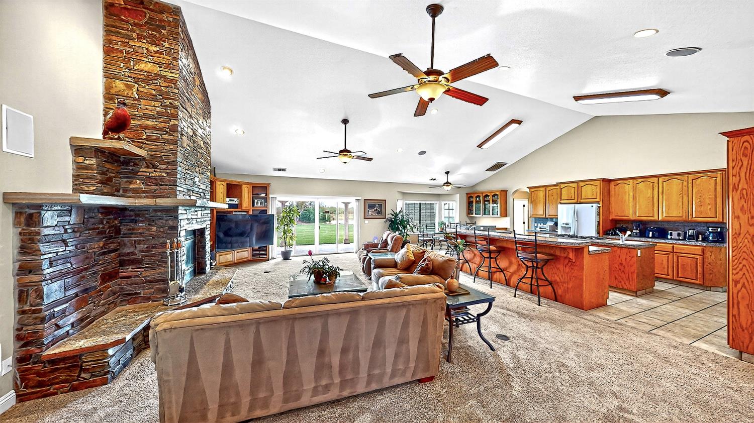 770 Merriam Road Hickman, CA 95323 - Photo 14 of 91 a living room with patio furniture and a large window