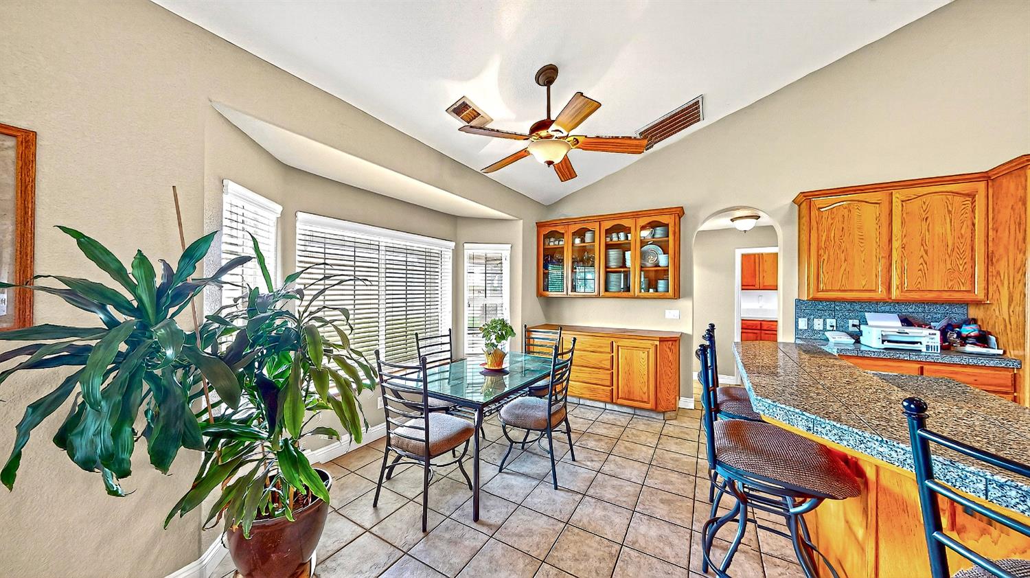 770 Merriam Road Hickman, CA 95323 - Photo 17 of 91 a living room with patio furniture and a potted plant