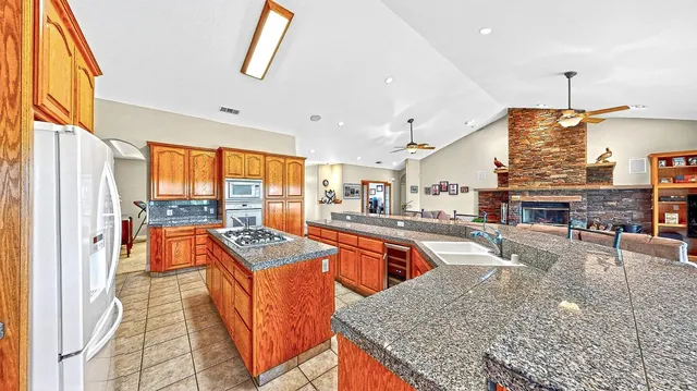 an outdoor space with lots of furniture and clutter