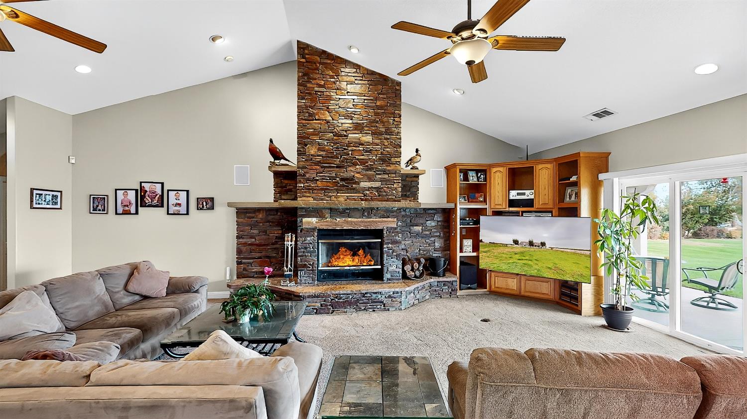 770 Merriam Road Hickman, CA 95323 - Photo 23 of 91 a living room with furniture and a fireplace