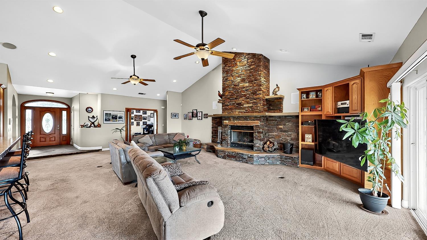770 Merriam Road Hickman, CA 95323 - Photo 24 of 91 a living room with furniture and a fireplace