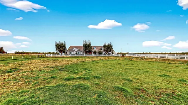a view of a house with a park
