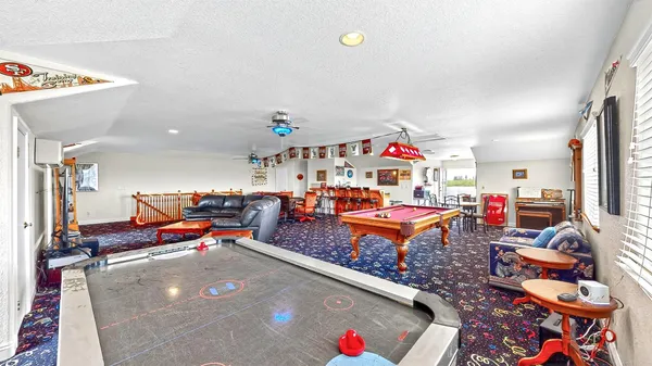 a view of a hallway with closet and a livingroom view