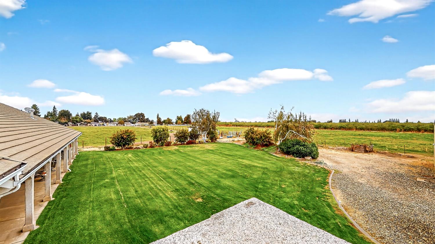770 Merriam Road Hickman, CA 95323 - Photo 35 of 91 a view of a lake with a big yard