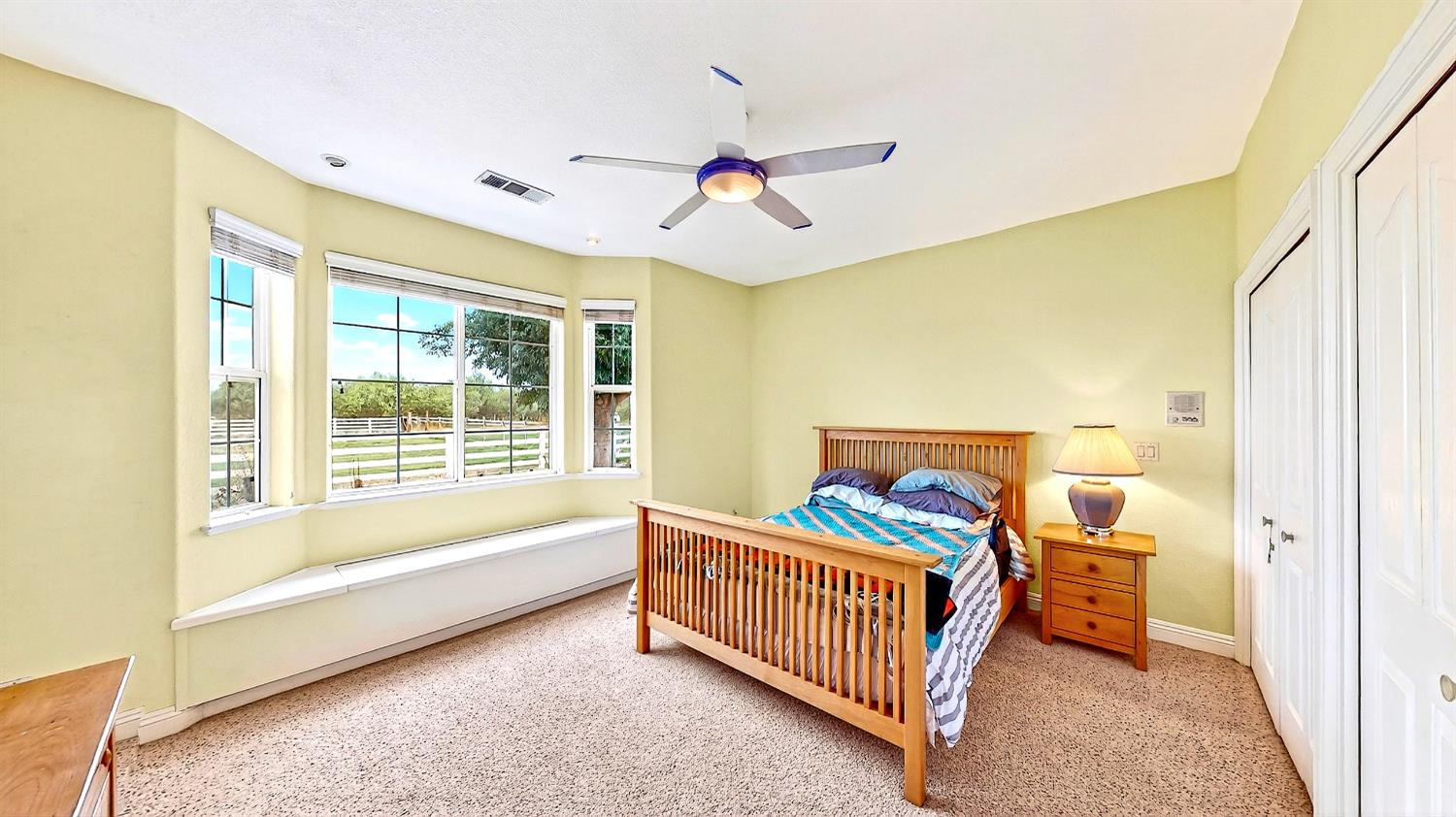 770 Merriam Road Hickman, CA 95323 - Photo 44 of 91 a bedroom with a bed and window