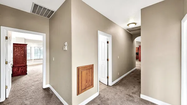 an aerial view of residential house with outdoor space and parking